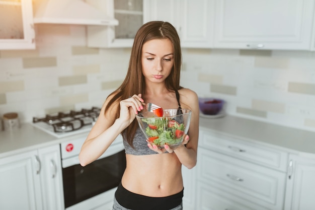 fitness girl eating healthy food