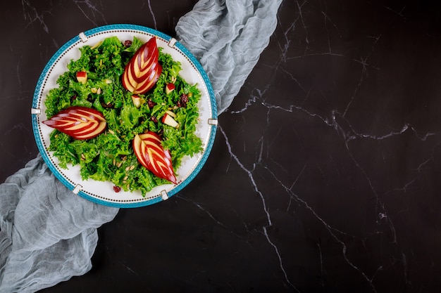 Fitness healty salad with kale and apple.