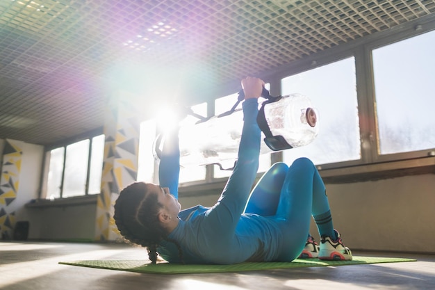 Fitness instructor shows new modern exercises