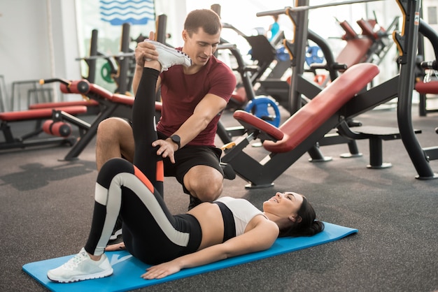 Fitness Instructor Working with Client