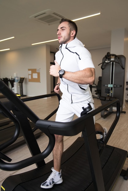 Fitness Man Running On Treadmill