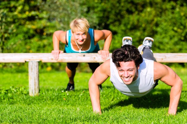 Fitness people doing pushups for sport