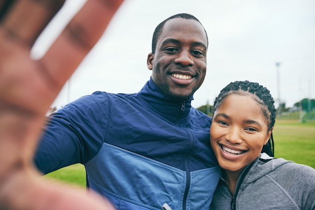 Fitness portrait black couple and selfie at park after exercise training or workout in winter Sports health and face of man and woman taking pictures or photos for social media or happy memory