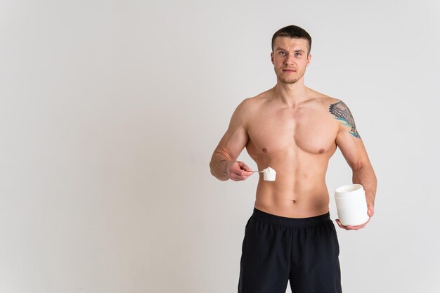 Fitness protein jars white on white background bodybuilder powder strong high ache injury cramp