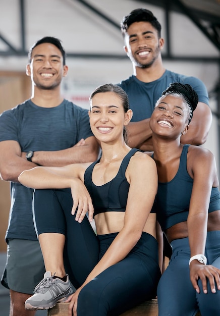 Fitness smile and portrait of friends in gym for teamwork support and workout Motivation coaching and health with people training in sports center for cardio endurance and wellness challenge
