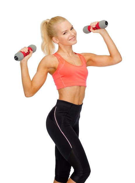 fitness, sport and diet concept - smiling beautiful sporty woman with dumbbells