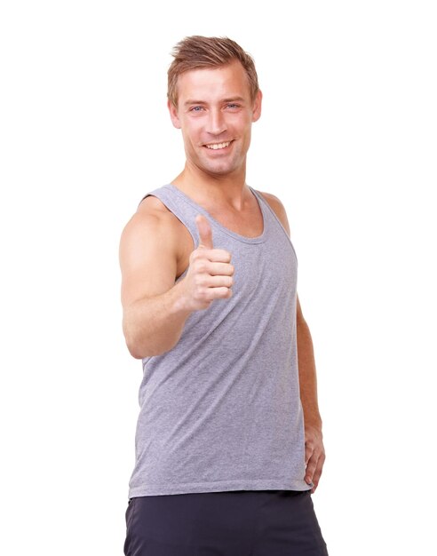 Fitness thumbs up and man in studio for training success workout achievement and health support or like emoji Portrait of sports model with yes vote hand or happy results on a white background