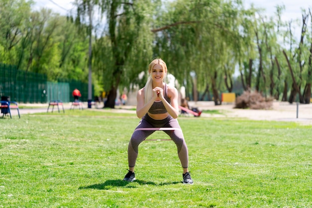 Fitness woman doing squats