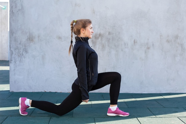 Fitness woman doing stretching