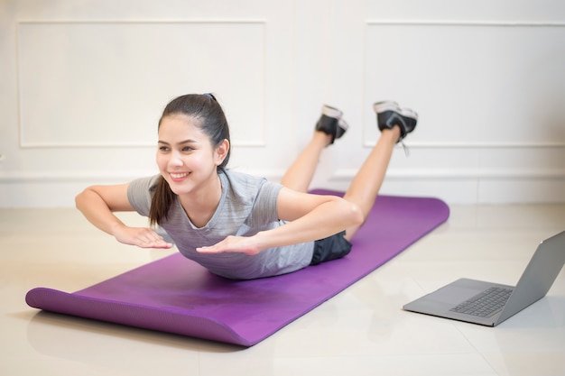 Fitness woman exercise in home