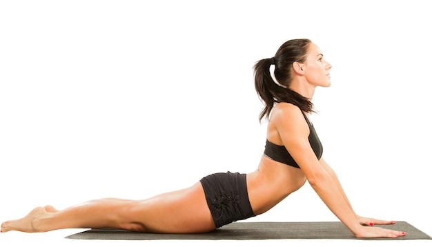 Fitness woman make stretch on yoga and pilates pose on isolated white background The concept of Sport and Health