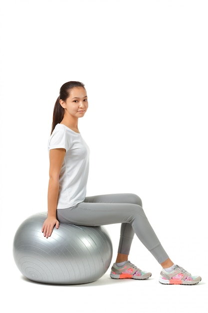 Fitness woman and pilates ball