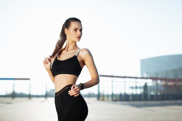 fitness woman posing outdoor