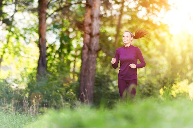 Fitness woman running outdoors