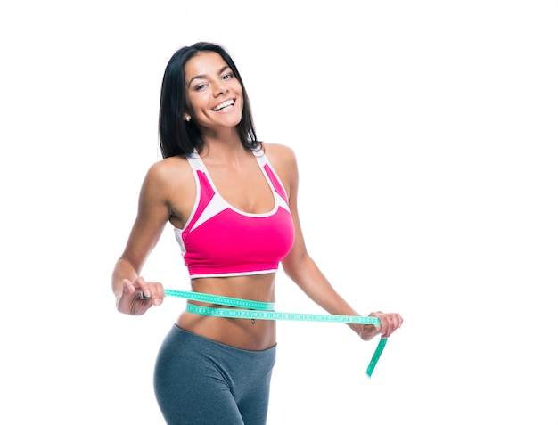 Fitness woman with measuring tape