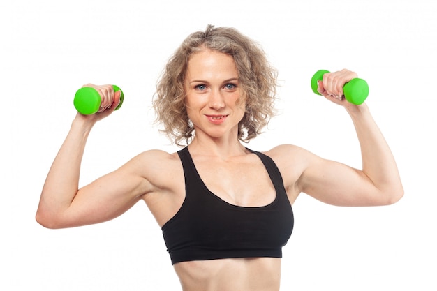 Fitness woman working out with dumbbell