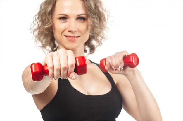 Fitness woman working out with dumbbell