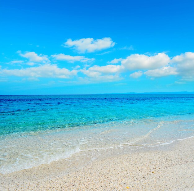 Fiume Santo turquoise water under a blue sky