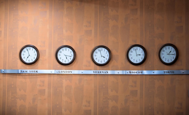 Five clocks with different time