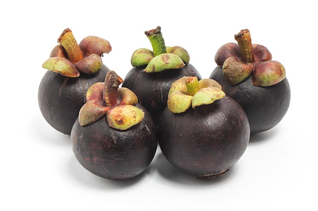 Five fresh organic mangosteen delicious fruit isolated on white background clipping path