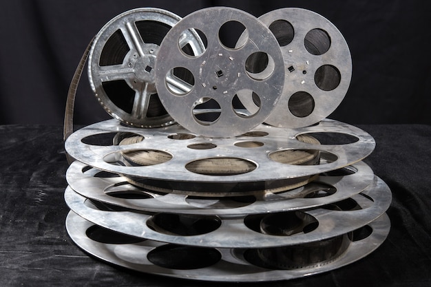 Five Movie reel on a black surface