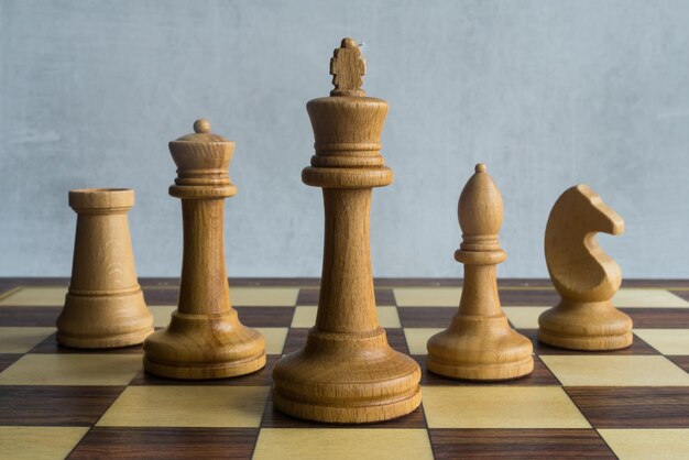 Five senior white chess figures