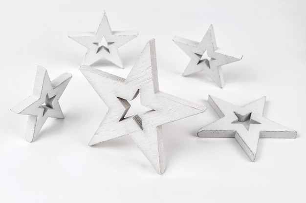 Five white stars on white background