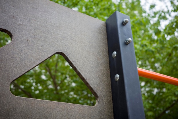 Fixing the horizontal bar on the playground