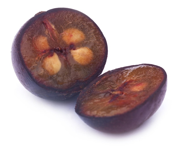 Flacourtia fruit over white background