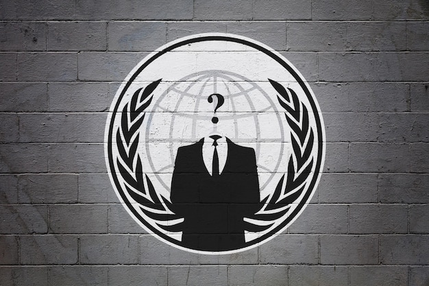 Flag of the Anonymous on brick wall