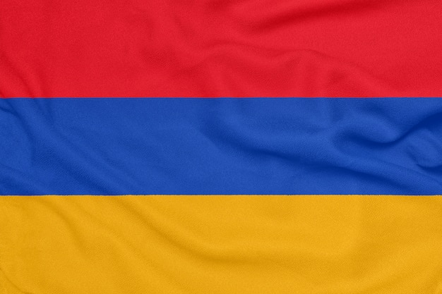 Flag of Armenia on textured fabric.