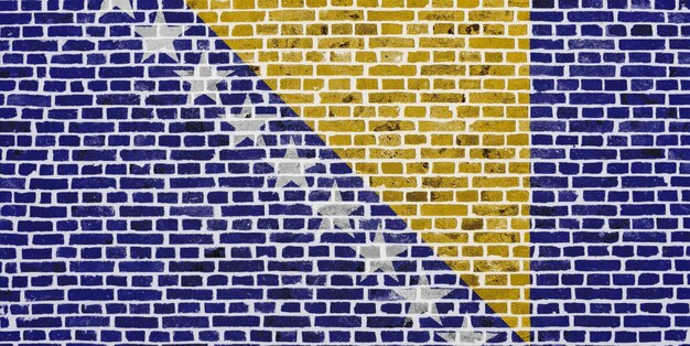 Flag of Bosnia and Herzegovina painted on a brick wall