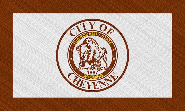 Flag of the city of Cheyenne Wyoming USA on a background of fabric texture Conceptual collage