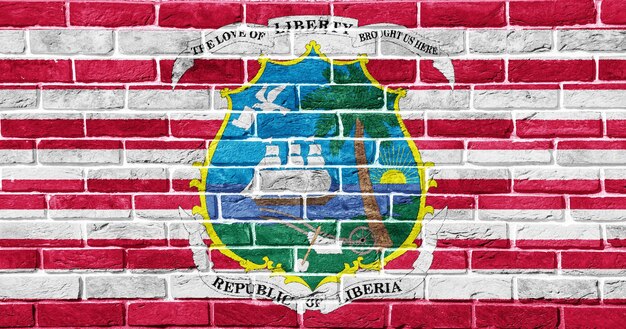 Photo flag and coat of arms of republic of liberia on a textured background concept collage