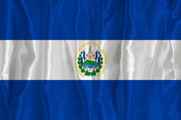 The flag of El Salvador on a silk background is a great national symbol Texture of fabrics The official state symbol of the country