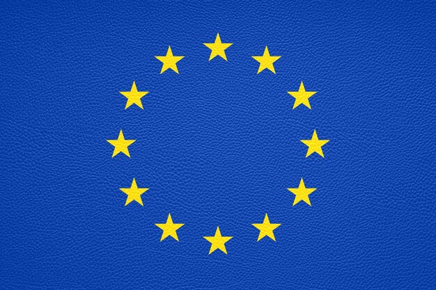 Foto bandiera dell'europa o dell'unione europea o dell'ue con sfondo in pelle