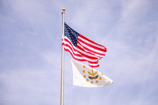 A flag and a flag with the words " the united states of america " on it.