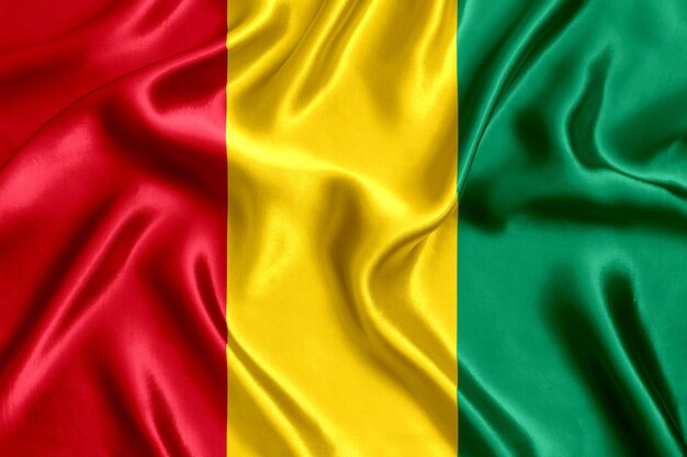 Flag of Guinea silk close-up background