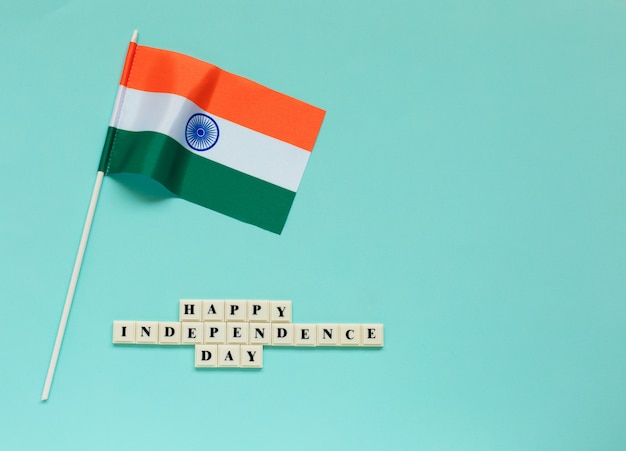 Flag of India with the inscription of a happy Independence day.