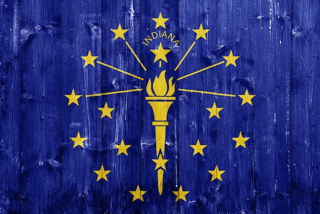 Foto bandiera dello stato dell'indiana usa su uno sfondo texturato concept collage