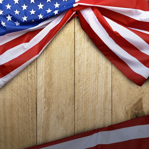 a flag is hanging on a wooden wall