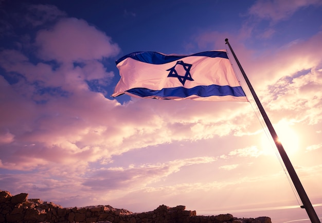 Foto bandiera di israele a masada contro il cielo mattutino