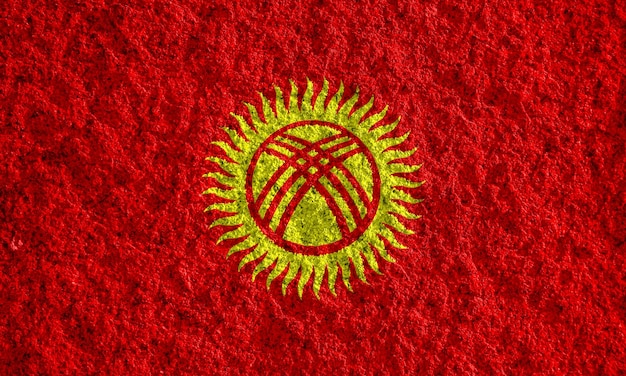 Flag of Kyrgyz Republic on a textured background Concept collage