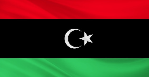 Photo flag of libya flying in the air