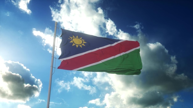 Flag of Namibia waving at wind against beautiful blue sky 3d rendering