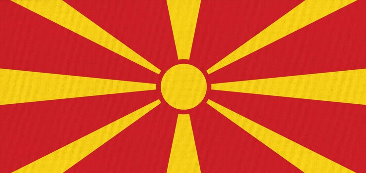 Photo flag of north macedonia north macedonia state symbol flag on fabric surface