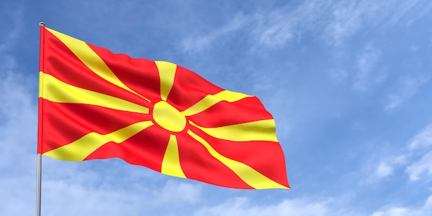 Flag of Northern Macedonia on flagpole on blue sky background Macedonian flag fluttering in the wind against a sky with clouds Place for text 3d illustration