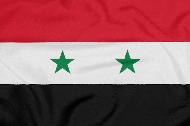 사진 질감 된 직물에 시리아의 국기입니다. 애국 기호