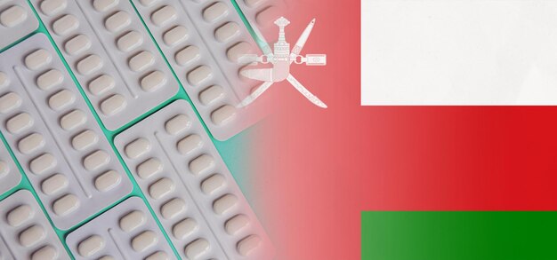 Flag of the oman with tablets pharmacology developments in the field of pharmaceuticals medicines antibiotics painkillers and epidemics increase in drug usage