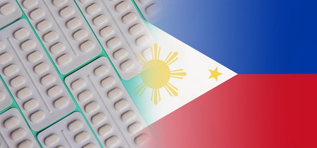 Flag of the philippines with tablets pharmacology developments